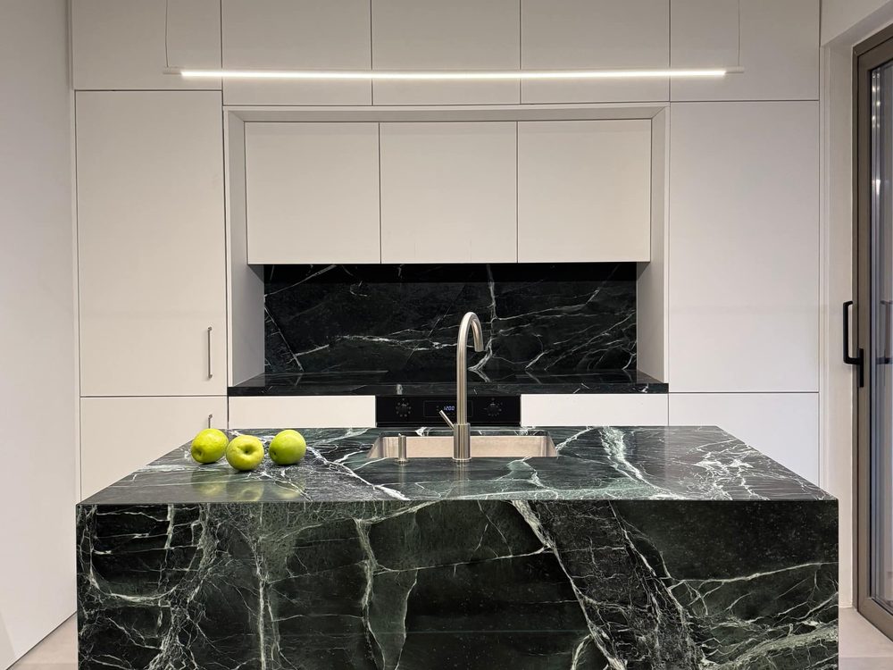 House II black-marble kitchen