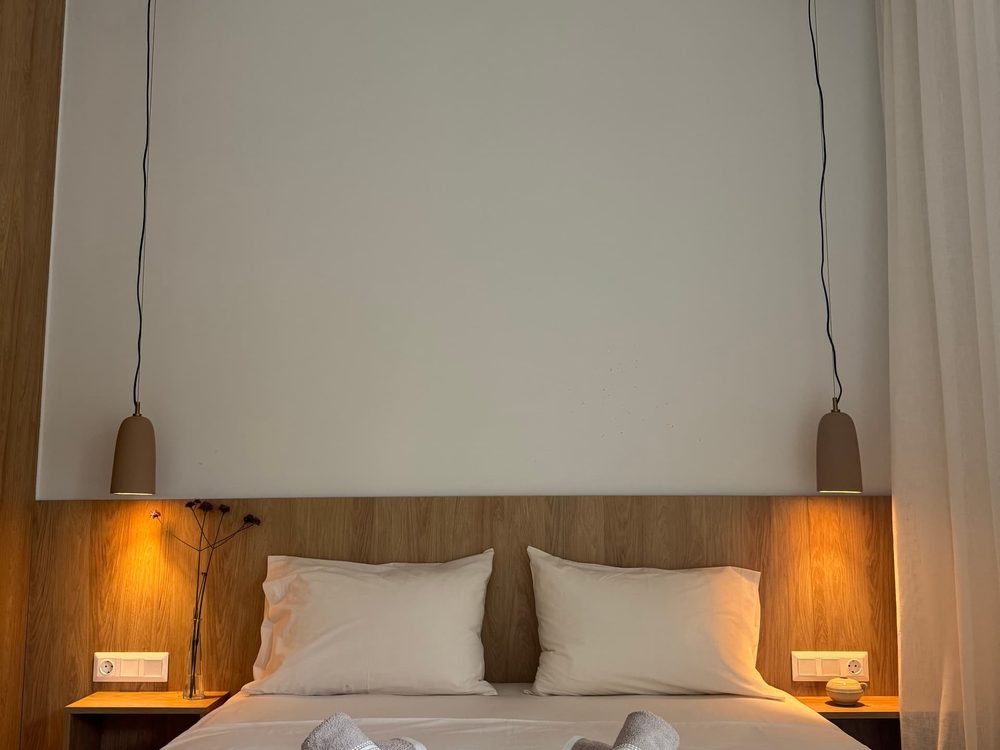 Wood-panelled bedroom with warm lighting